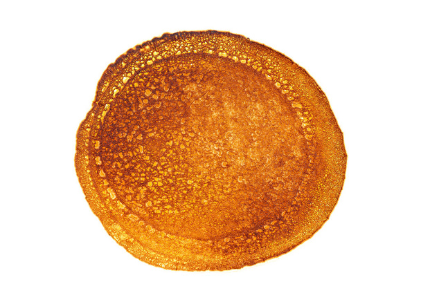 Tasty pancake isolated on a white background, top view - Foto, immagini