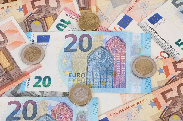 a heap of different euros are lying in the studio - Φωτογραφία, εικόνα