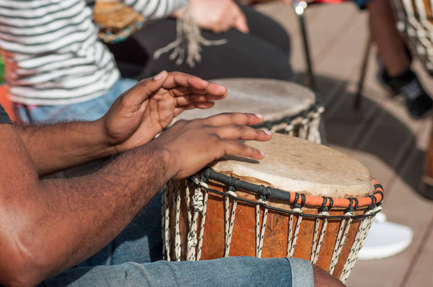 man hands on african drums in outdoor - Fotoğraf, Görsel