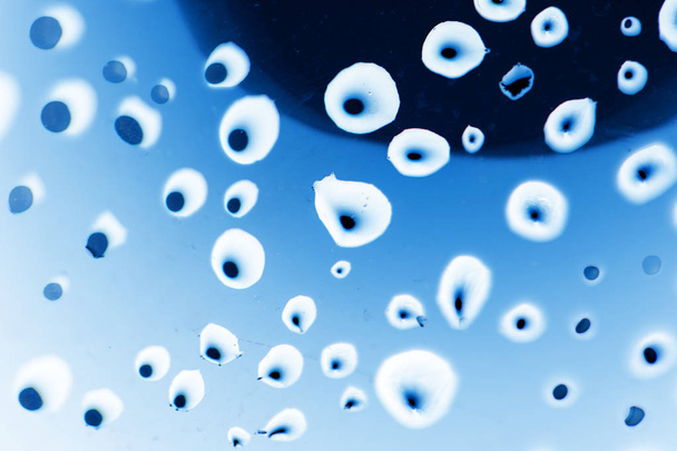 drops of water on a blue background - Foto, Imagen