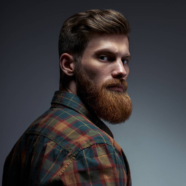 Portrait of a man with beard and modern hairstyle - Φωτογραφία, εικόνα
