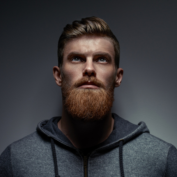 Portrait of a bearded european with blue eyes - Foto, imagen