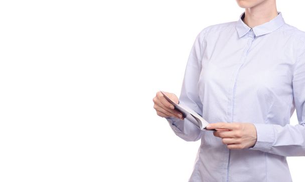 Woman business in a shirt in the hands passport - 写真・画像
