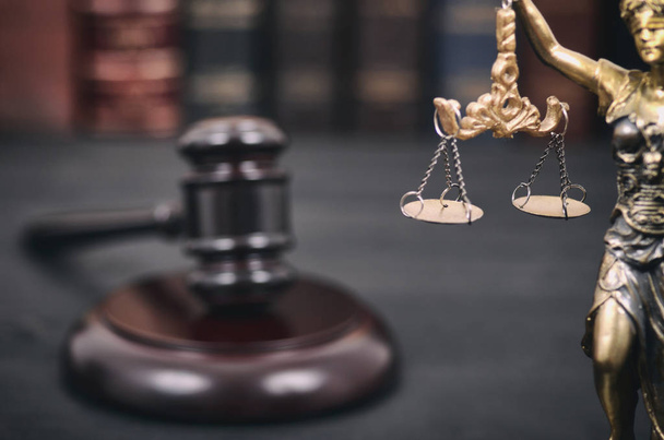 Judge Gavel and Lady Justice on a black wooden background. - 写真・画像