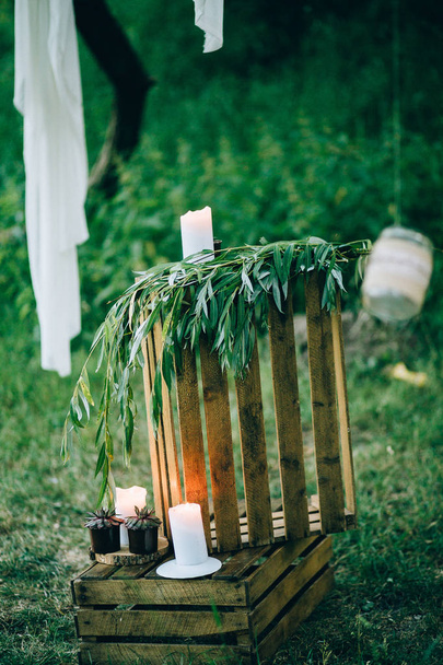 beautiful  decoration with candles  in garden   - Fotó, kép