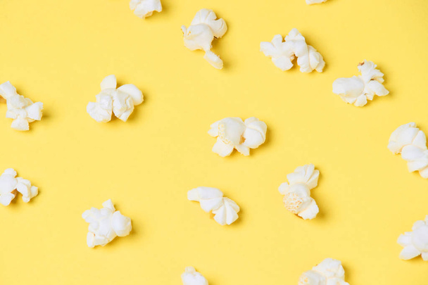 Fresh white popcorn. Fried corn. Yellow bright background - Φωτογραφία, εικόνα