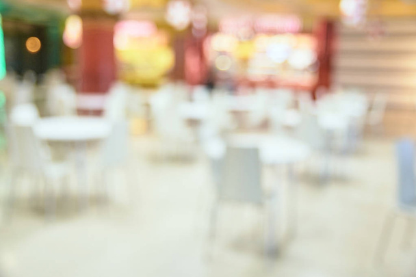 Blurred background. Food court. White tables - Zdjęcie, obraz