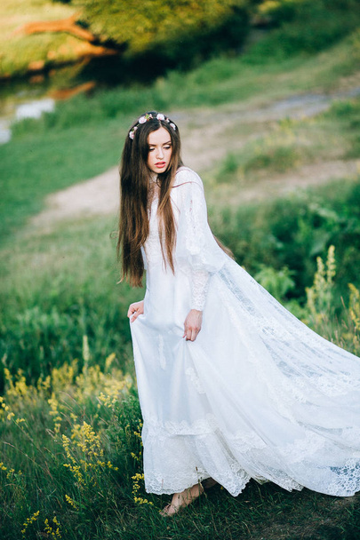 young  beautiful  bride posing outdoors - Valokuva, kuva