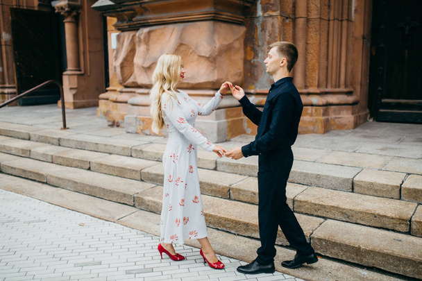 young beautiful couple dancing  in  city  - Photo, Image