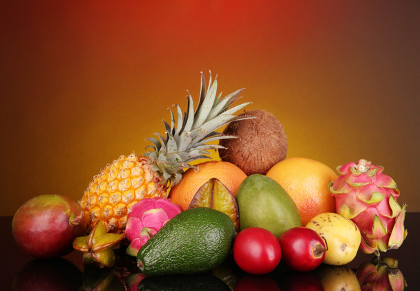 Composition of exotic fruits on colorful background - Foto, Bild