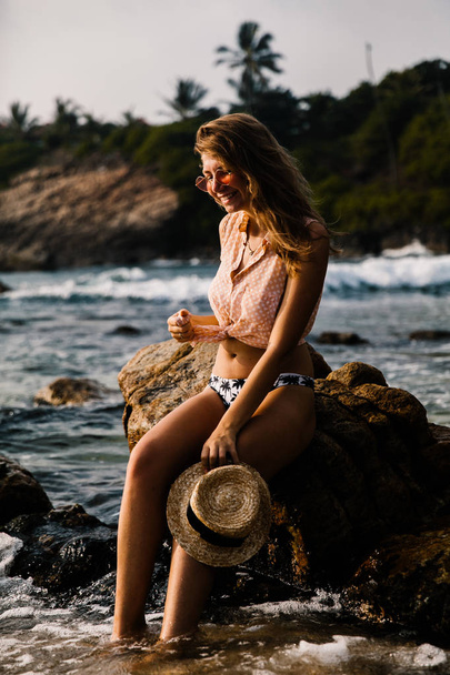 young beautiful woman posing on beach - Photo, image