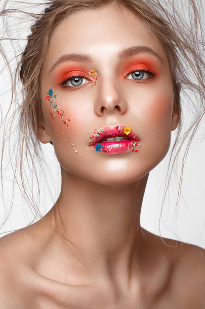 Beautiful girl with art make-up and flowers. beauty face. - Photo, Image