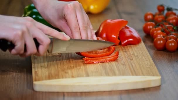 Cut red peppers prepared food - Footage, Video