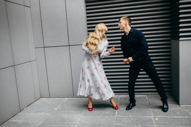 young beautiful couple dancing in  city  - 写真・画像