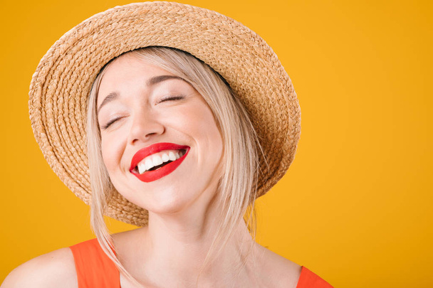 laughing with delight pleasure satisfied smile. Adorable blonde woman in straw hat. Summer mood - Foto, immagini