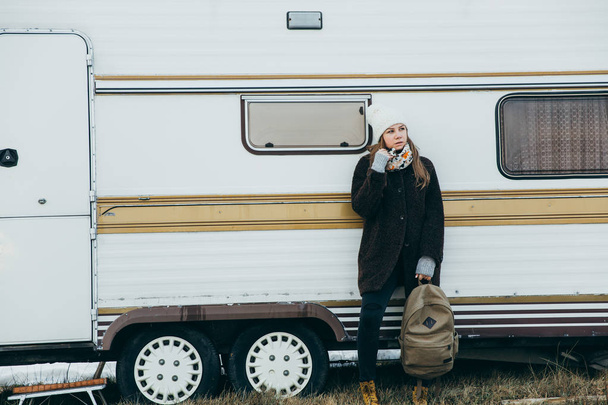 Young woman near the white trailer - Fotografie, Obrázek