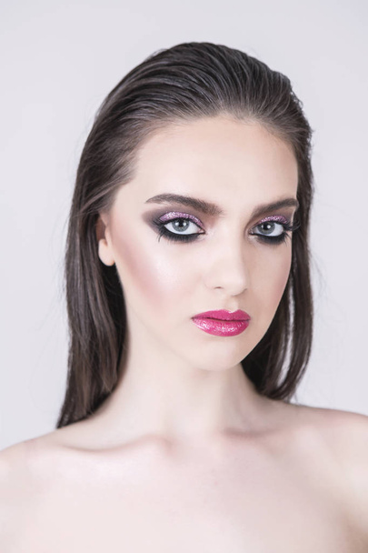 Beauty shot of a young model with nice evening make up. - Foto, afbeelding