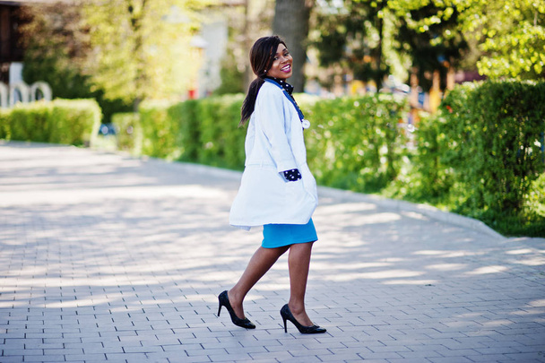 African american doctor female with stethoscope posed outdoor. - Фото, изображение