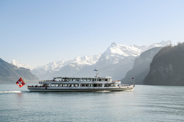 Cruise ship with tourists on Lake Lucerne near Brunnen - 写真・画像