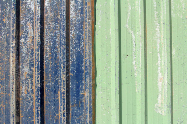 blauwe en groene roestige metalen plaat - Foto, afbeelding