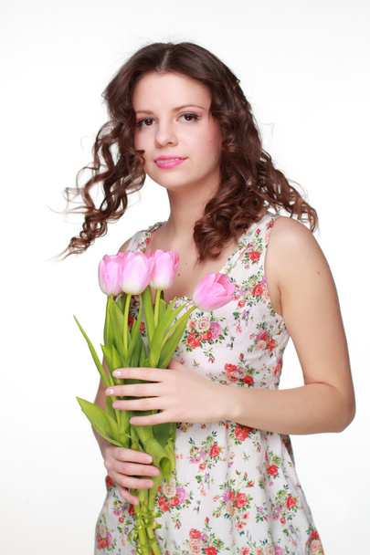 Girl with spring flower - Фото, изображение