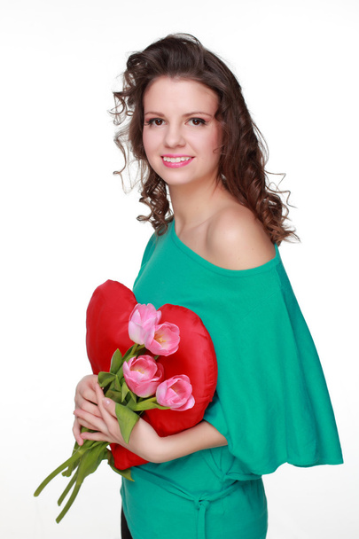 Girl with symbol of heart and tulips - Zdjęcie, obraz