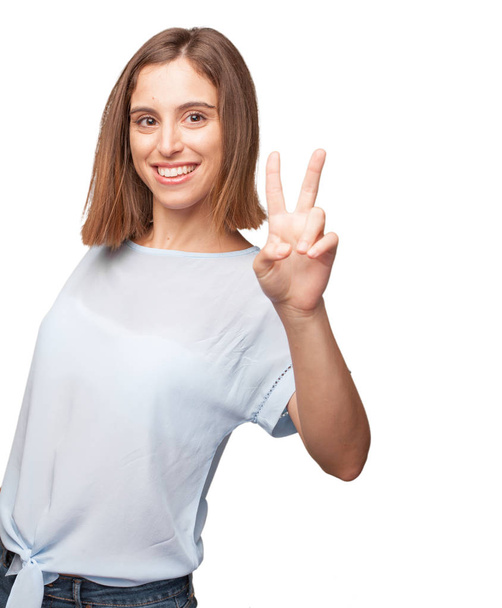young pretty woman with victory sign - Φωτογραφία, εικόνα