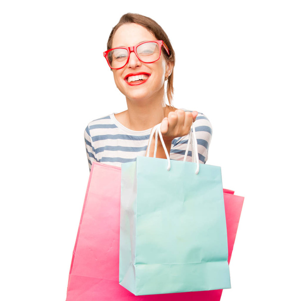 young pretty woman with shopping bags - Fotó, kép