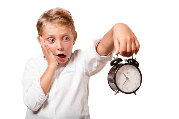 young boy with an alarm clock - Foto, immagini