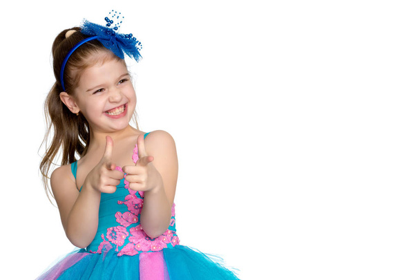 Little girl points with a finger - Φωτογραφία, εικόνα