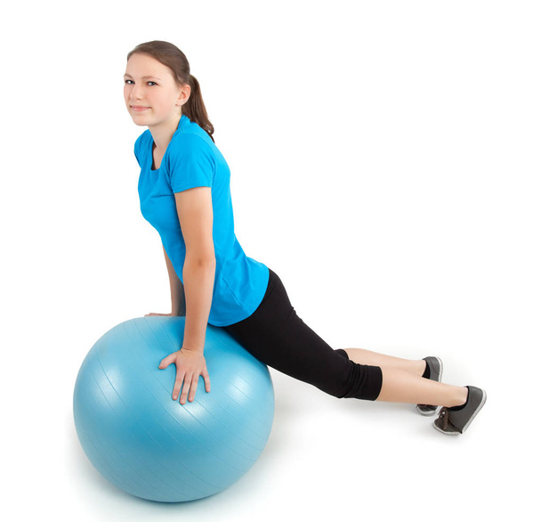 Ejercicios de fitness con bola azul
 - Foto, Imagen
