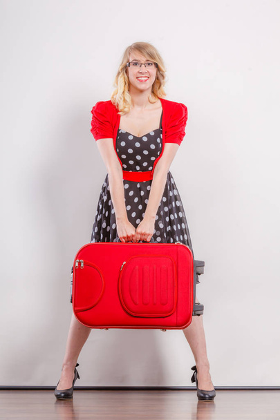 Elegant fashion woman with red suitcase - Photo, image