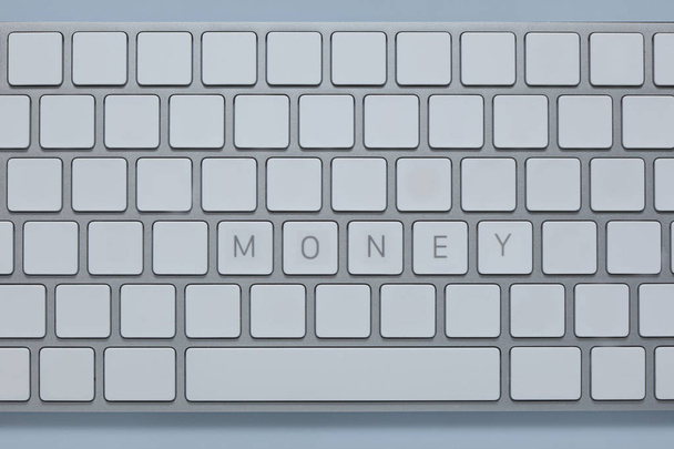 word money on the computer keyboard with others keys deleted - Photo, Image