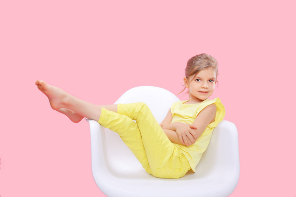 Stylish little girl in yellow n pink - Fotografie, Obrázek