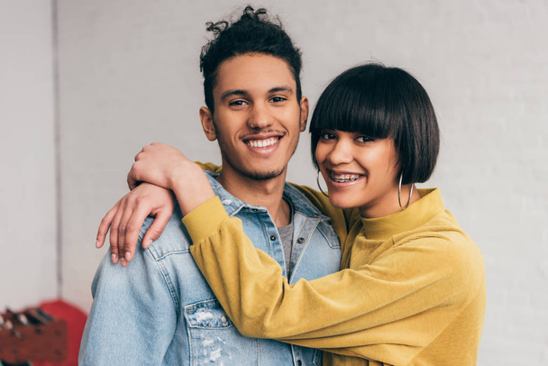 portrait of young smiling mixed race couple  - Fotó, kép