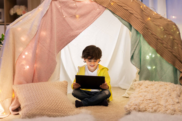 little boy with tablet pc in kids tent at home - Φωτογραφία, εικόνα