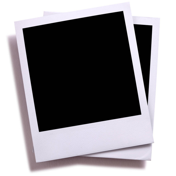 zwei leere Polaroid-Stil Sofortkamera Fotoabzüge isoliert auf weiß  - Foto, Bild