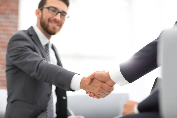 Close up of business handshake in the office - Φωτογραφία, εικόνα