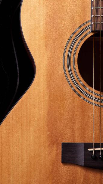Close-up of the acoustic guitar with metal strings - Photo, Image