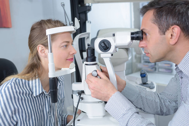 woman doing eye test - Photo, Image