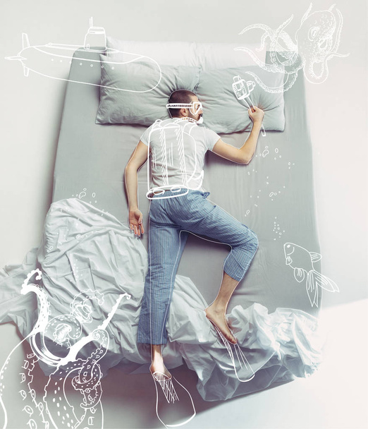 Top view photo of young man sleeping in a big white bed and his dreams - Fotoğraf, Görsel