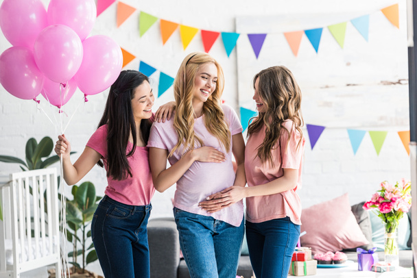 multicultural women touching pregnant friend belly at baby-party - Photo, Image