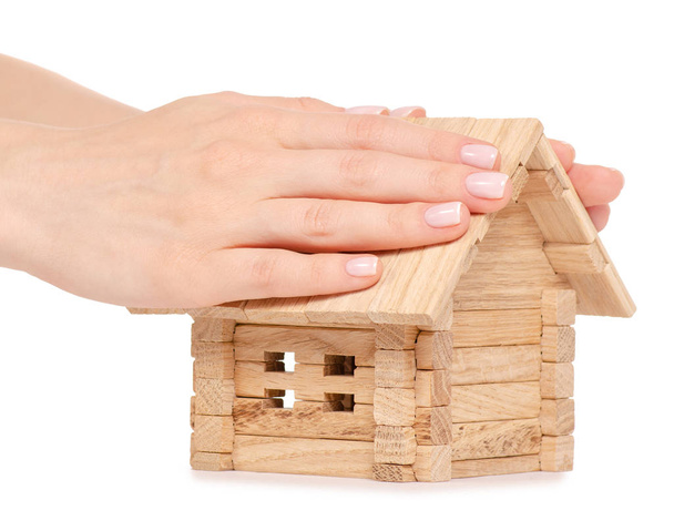Casa de madeira pequena na mão
 - Foto, Imagem