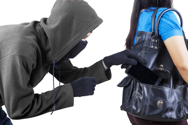 Unknown robber stealing phone on studio - Zdjęcie, obraz