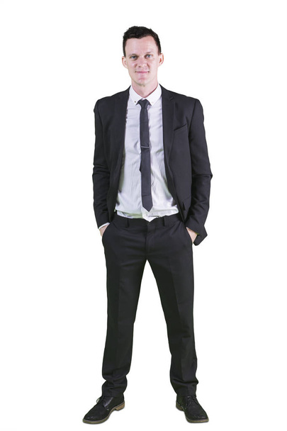 Confident American businessman standing on studio - Foto, Imagem