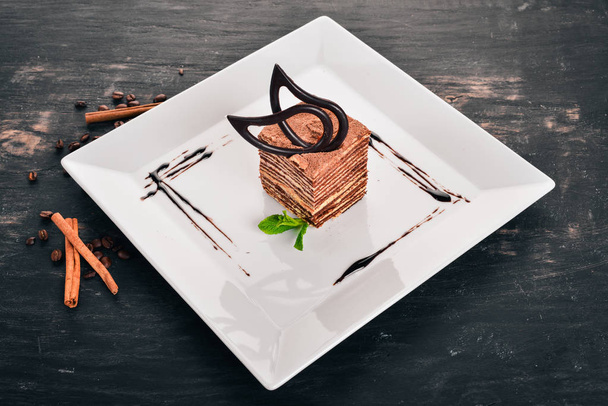 Dessert. Cake Spartak. On a wooden background. Top view. Copy space. - Φωτογραφία, εικόνα