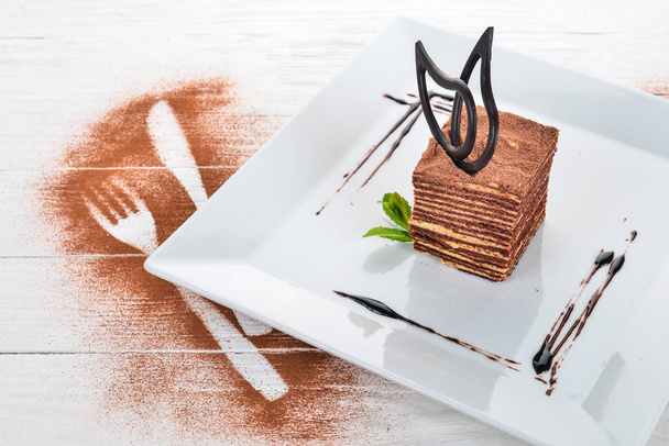 Dessert. Cake Spartak. On a wooden background. Top view. Copy space. - Φωτογραφία, εικόνα