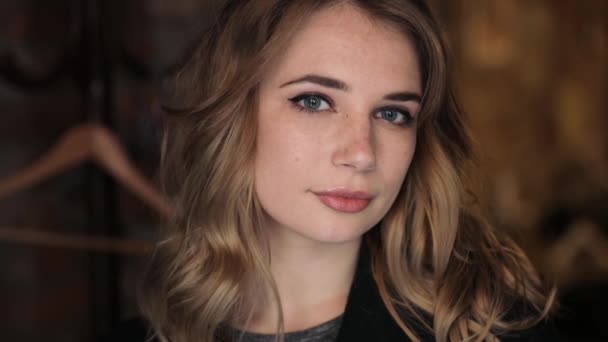 Beautiful attractive portrait of young woman closeup - Video