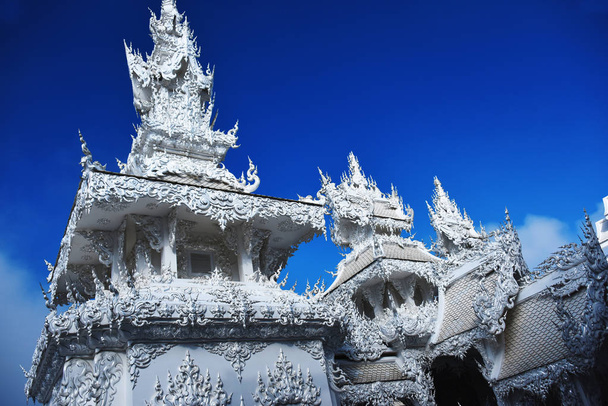 Architecture at Wat Rong Khun or the White Temple, a Buddhist temple in Chiang Rai, Thailand - Photo, Image