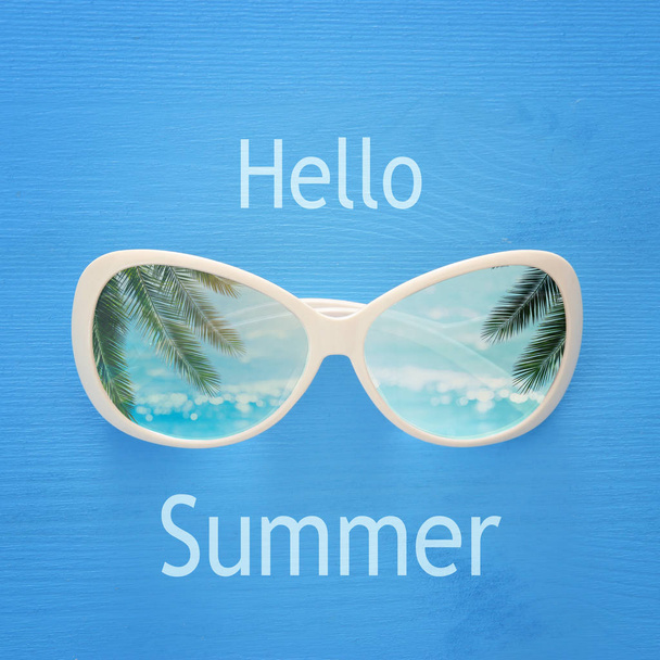 vacation and summer image with wooden background - Foto, Imagem
